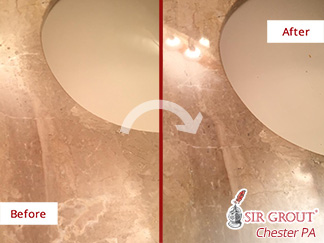 Before and after Picture of This Marble Vanity Top after a Stone Polishing Service in Bryn Mawr, PA