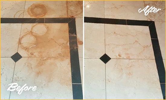 Before and After Picture of a Bryn Mawr Hard Surface Restoration Service on a Marble Floor to Eliminate Rust Stains